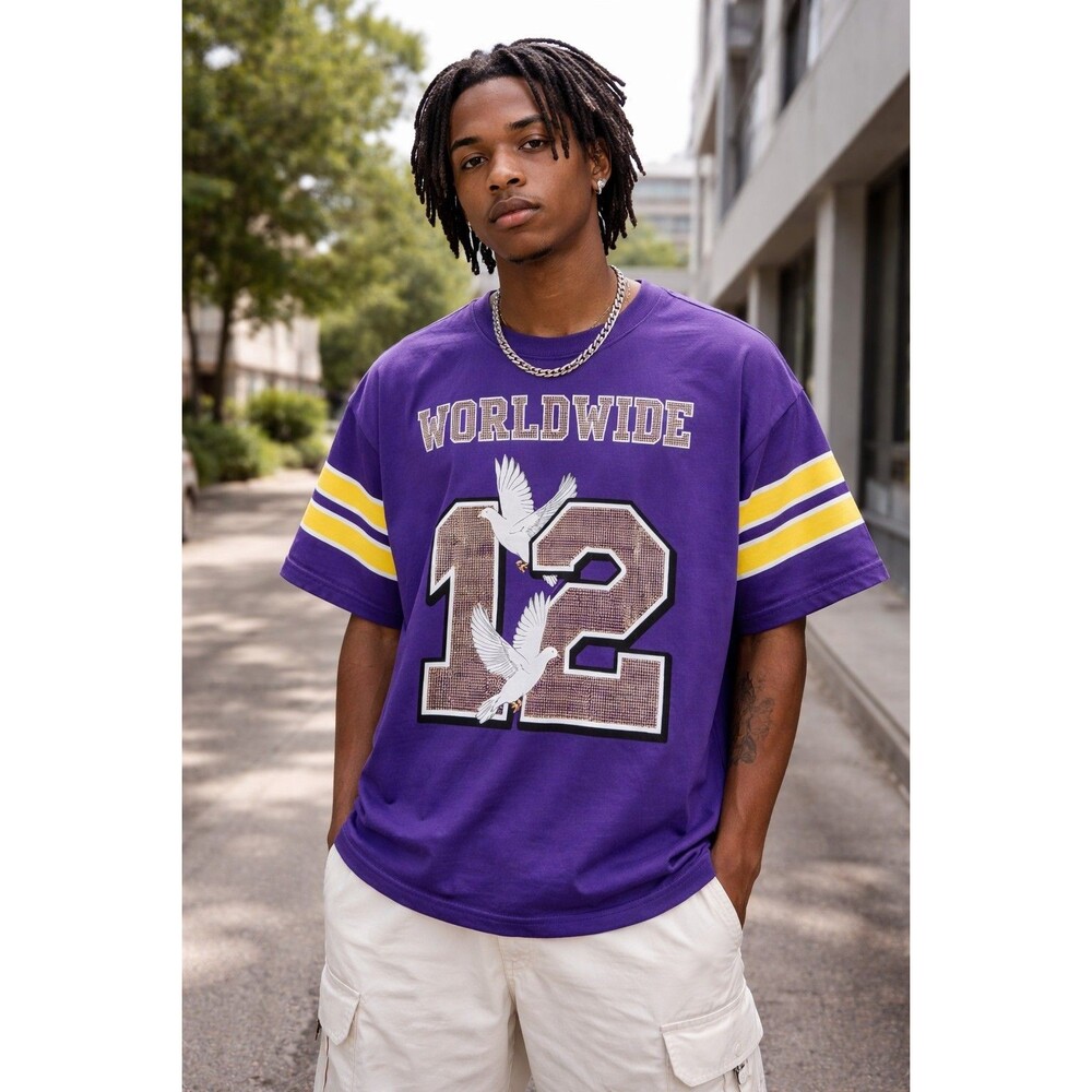 New purple Copper Rivet jersey shirt with "WORLDWIDE 12" and dove graphics.